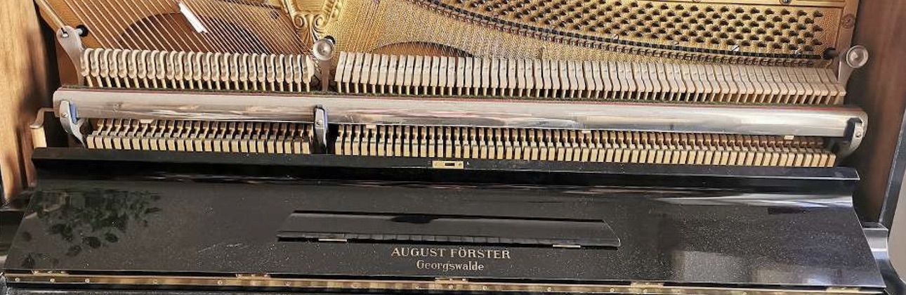 Open mechanics of an August Förster upright piano